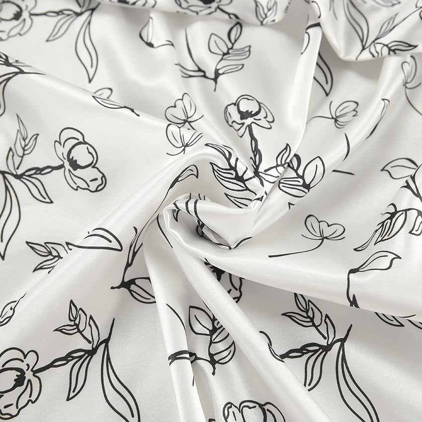 Dame pyjamasæt med detaljeret blomsterdesign og luftig pasform Stilla