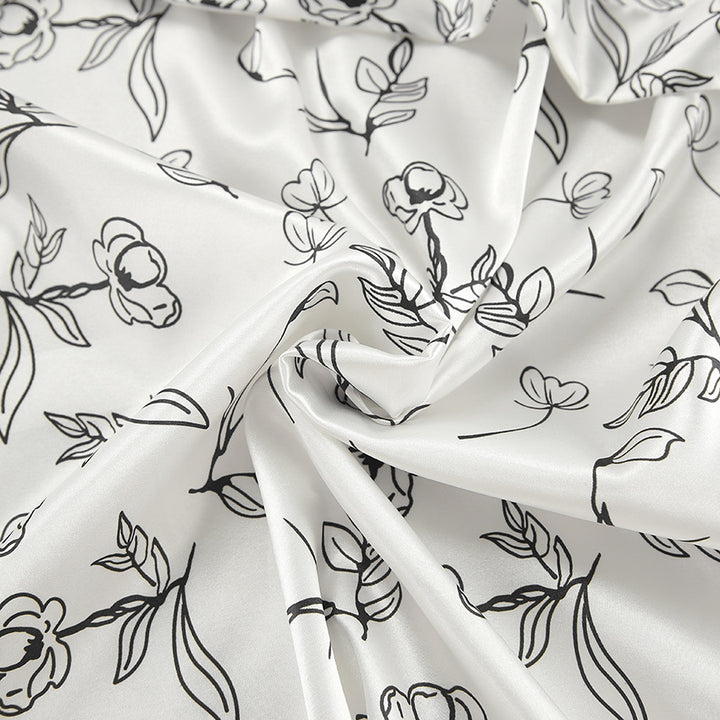 Dame pyjamasæt med detaljeret blomsterdesign og luftig pasform Stilla