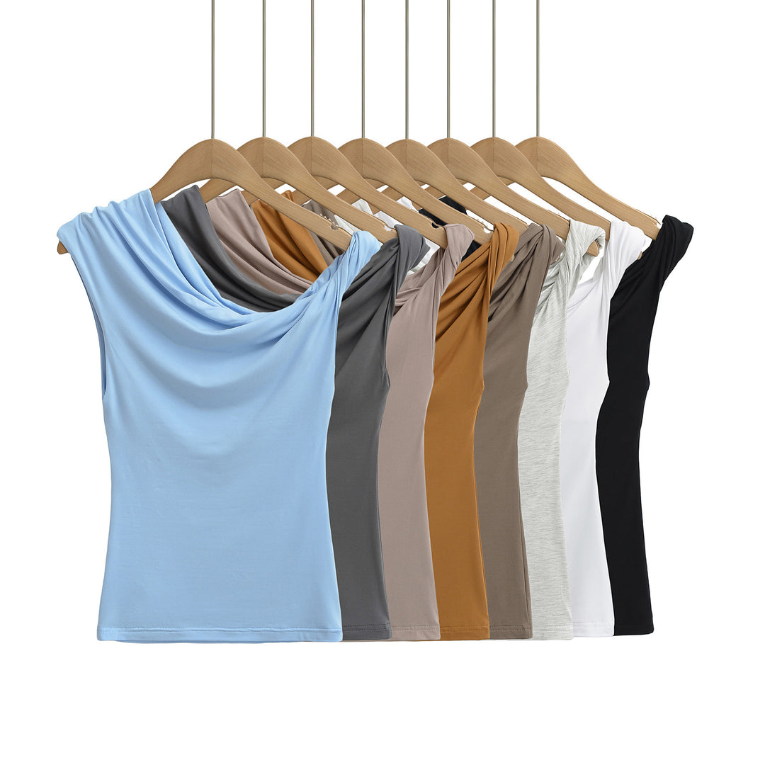 Dameoverdel med asymmetrisk skulderdesign og charmerende draperingseffekt Stilla