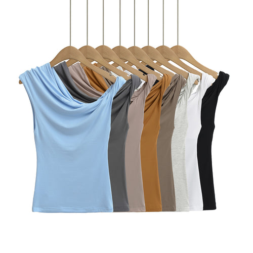 Dameoverdel med asymmetrisk skulderdesign og charmerende draperingseffekt Stilla