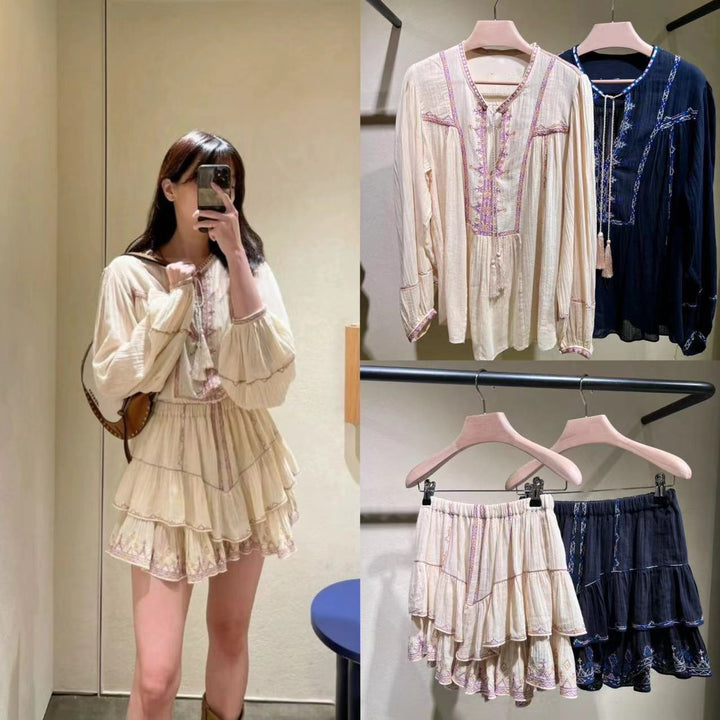 Damebluse med detaljeret broderedesign og fransede accenter Stilla