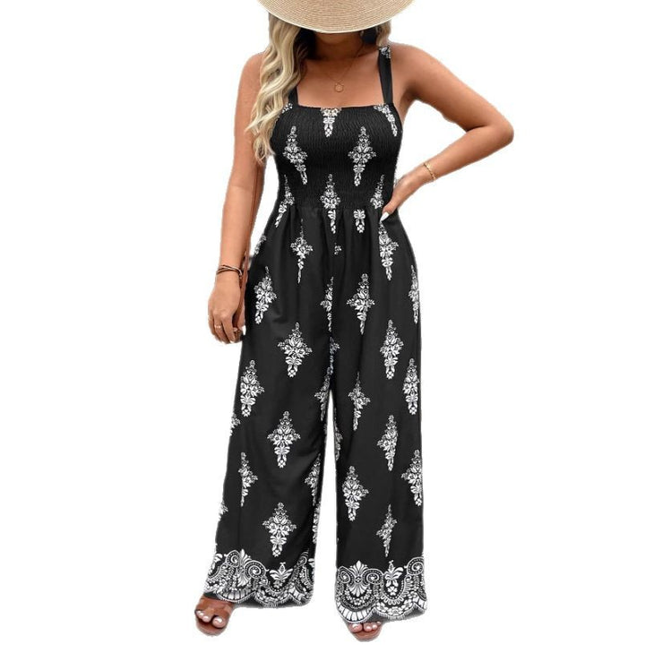 Dame jumpsuit med elegant blomstret design og bredt ben Stilla
