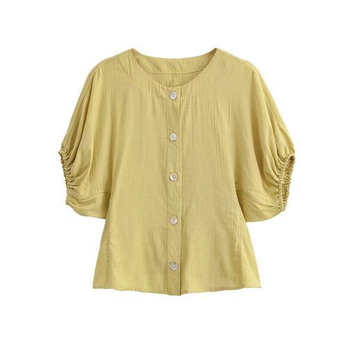 Damebluse med puffærmer og dekorative knapper Skovae
