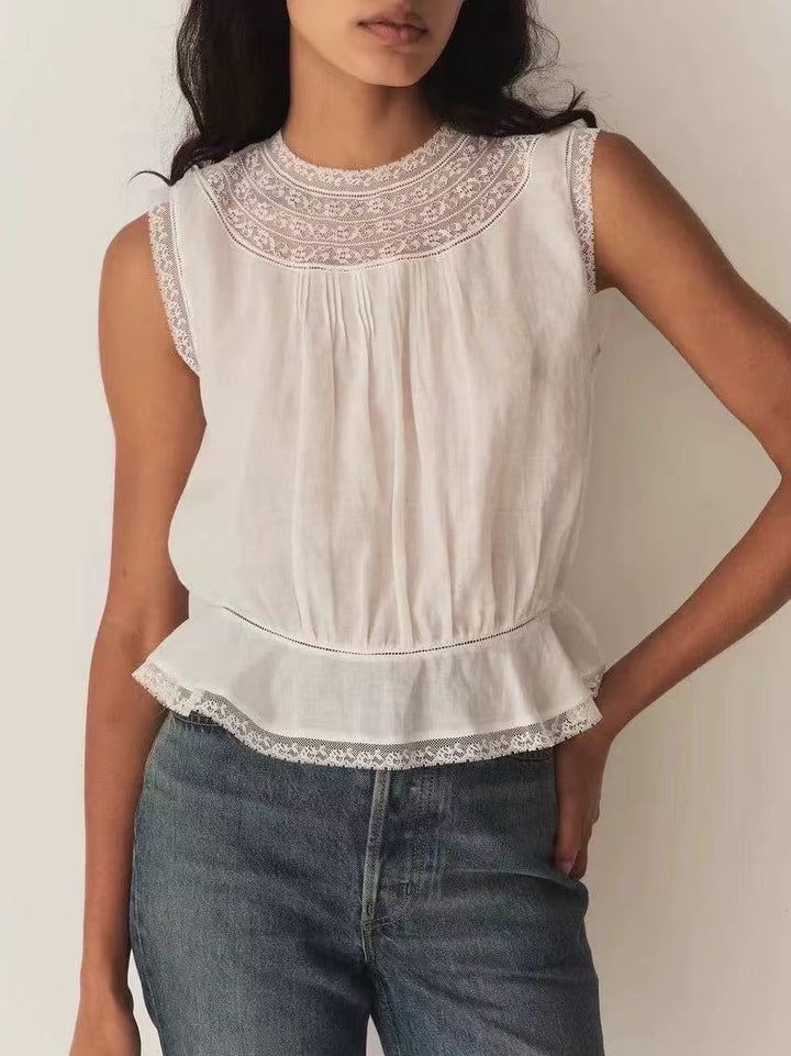 Damebluse med fine spidsdetaljer og let A-formet snit Stilla