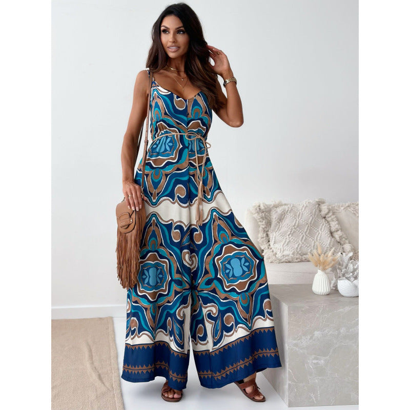 Dame jumpsuit med blomsterdesign og taljerbar bælte Skovae