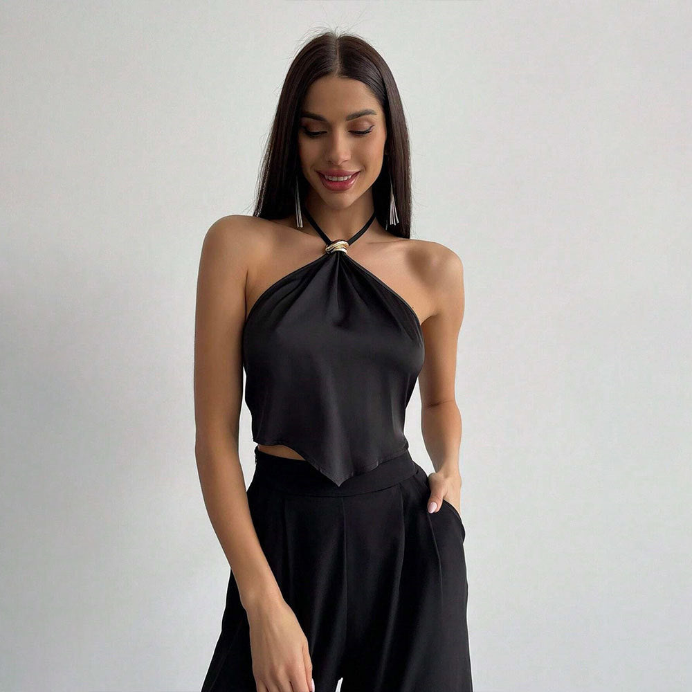 Dames elegant halterneck top med shiny stof og dekorativ knude Stilla