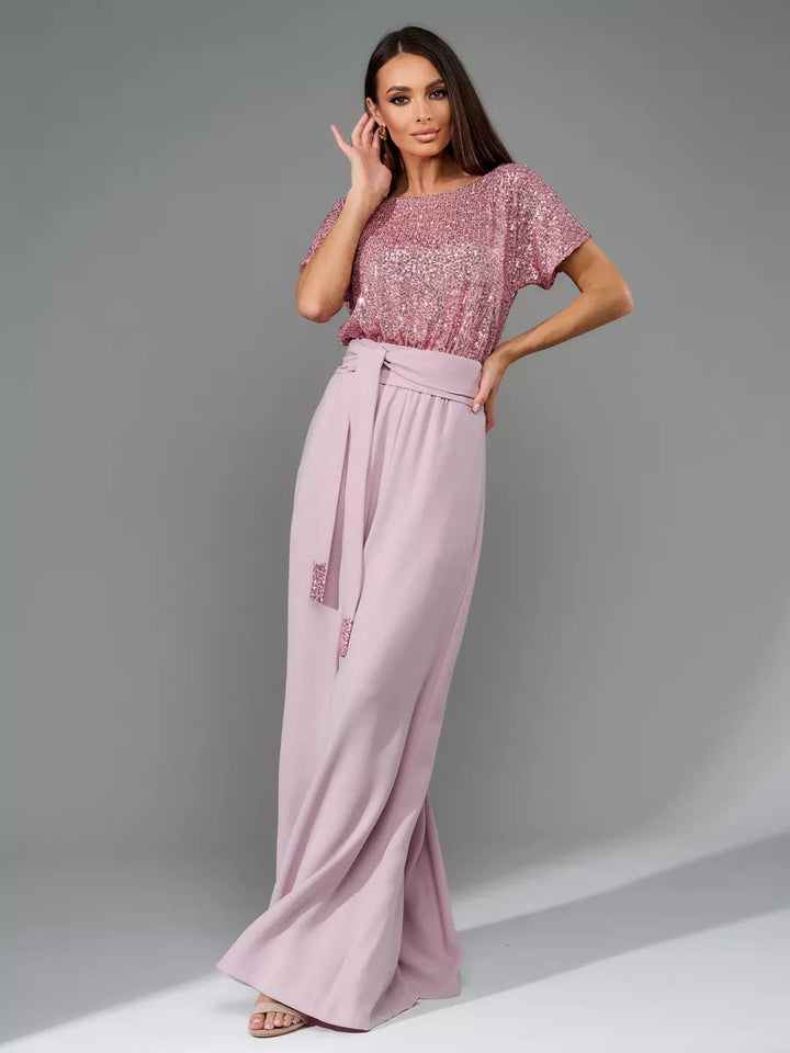 Dame glamourøs stil-outfit med glitrende top og bred pasform Skovae