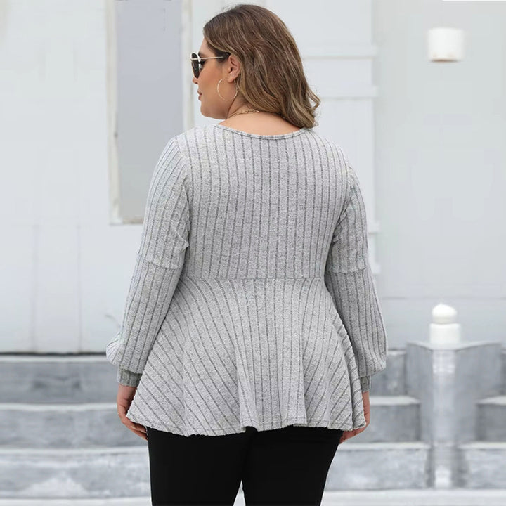 Dame elegant V-hals top med flydende snit og ribstruktur Stilla