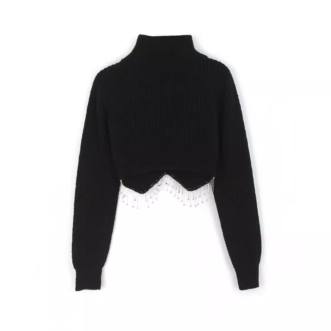 Dame moderigtig rullekravesweater med glitrende dekorationer Stilla
