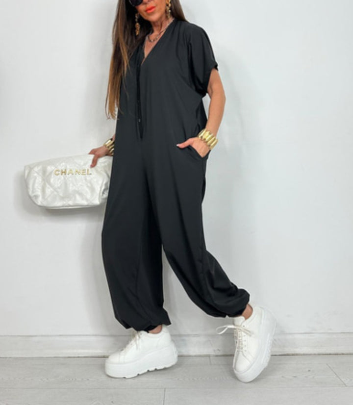 Kvinders oversized jumpsuit med moderne leopardprint og praktiske lommer Stilla