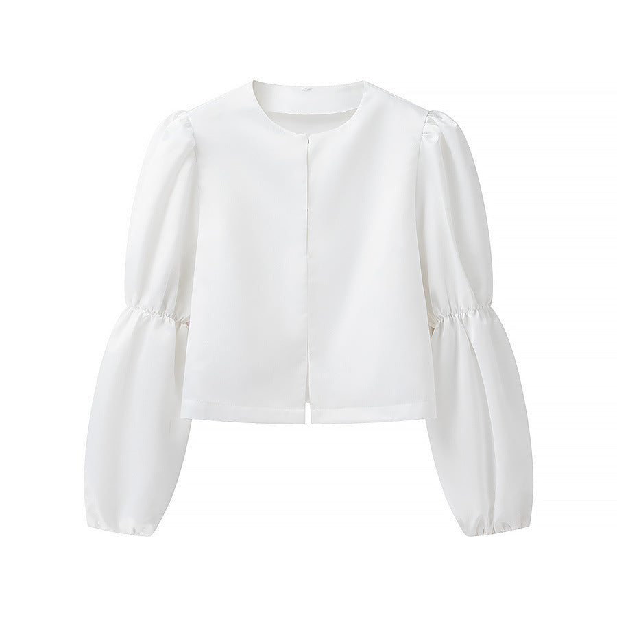 Kvindernes elegant skræddersyede blouse med voluminøse ærmer Stilla