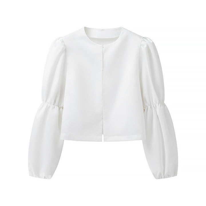 Kvindernes elegant skræddersyede blouse med voluminøse ærmer Stilla