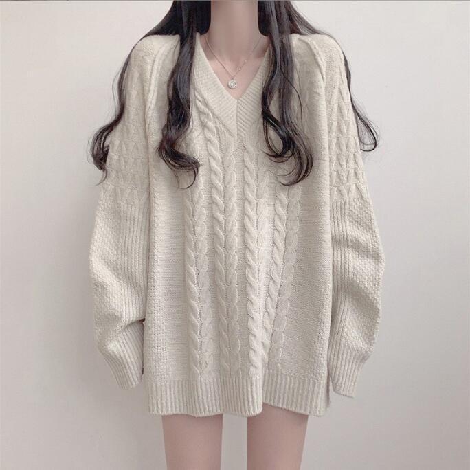 Kvindernes oversized strikket sweater med kabelmønster og V-hals Stilla