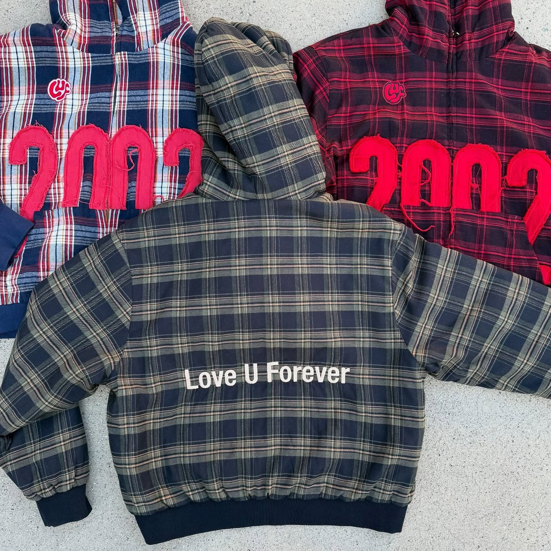 Unisex nan checkered hoodie with frayed year appliqué and ribbed cuffs Skovae
