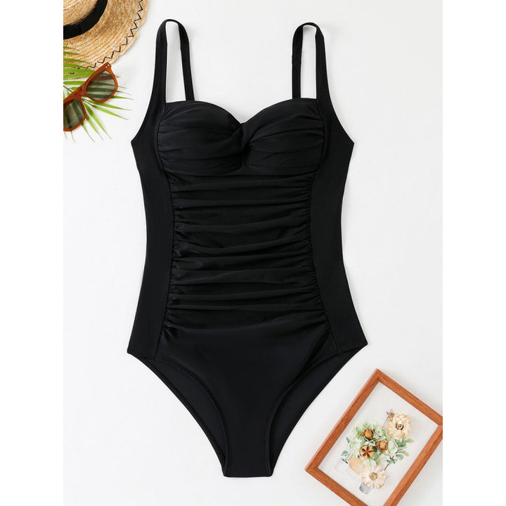 Dame one-piece badedragt med figurformende snit og elegant halterneck Skovae