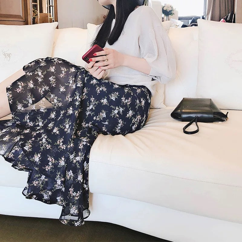 Dame luftigt Maxiskørt med floralt design og asymmetrisk snit Stilla