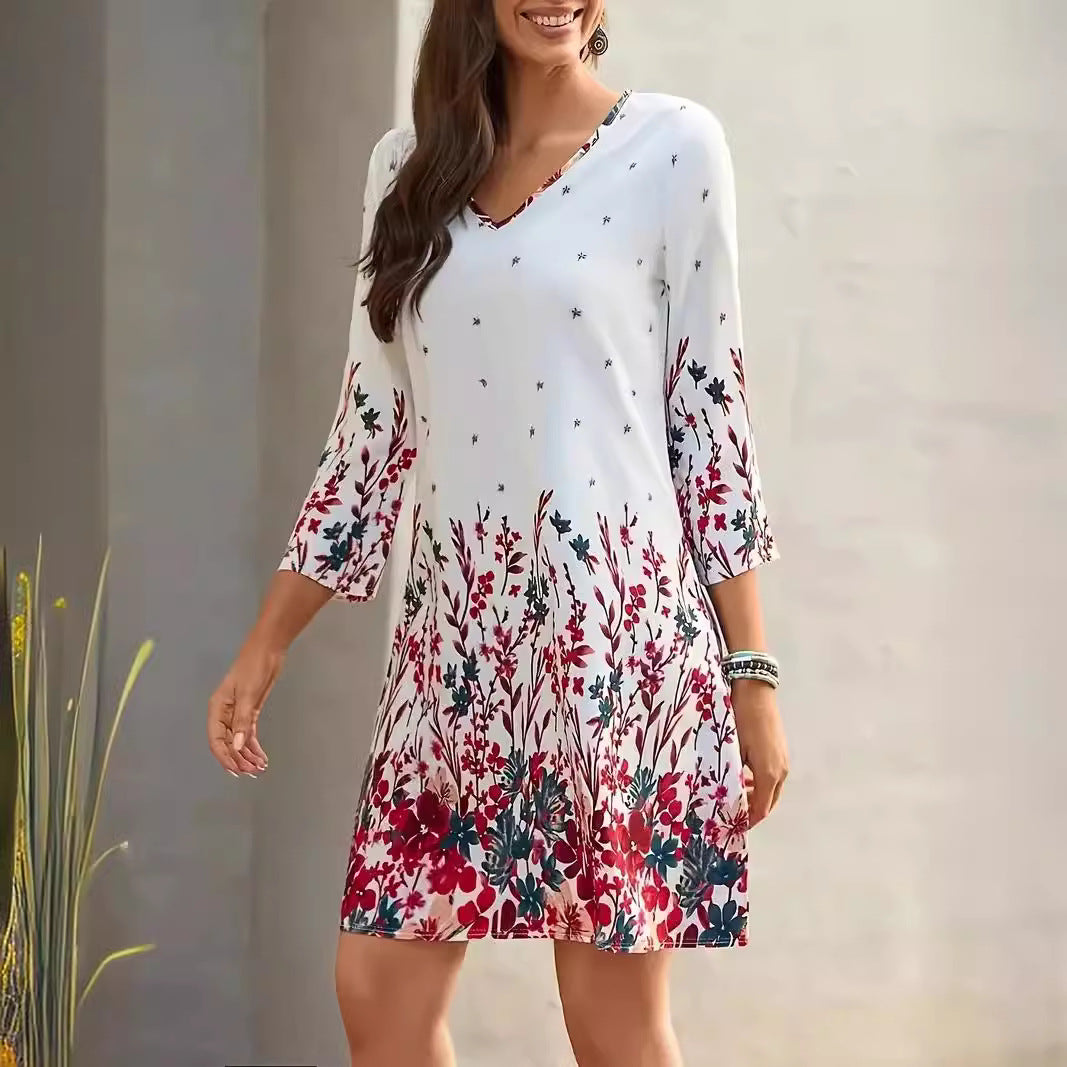 Dame sommerkjole med floralt design og V-udskæring Stilla
