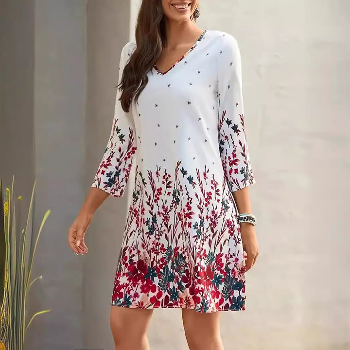 Dame sommerkjole med floralt design og V-udskæring Stilla