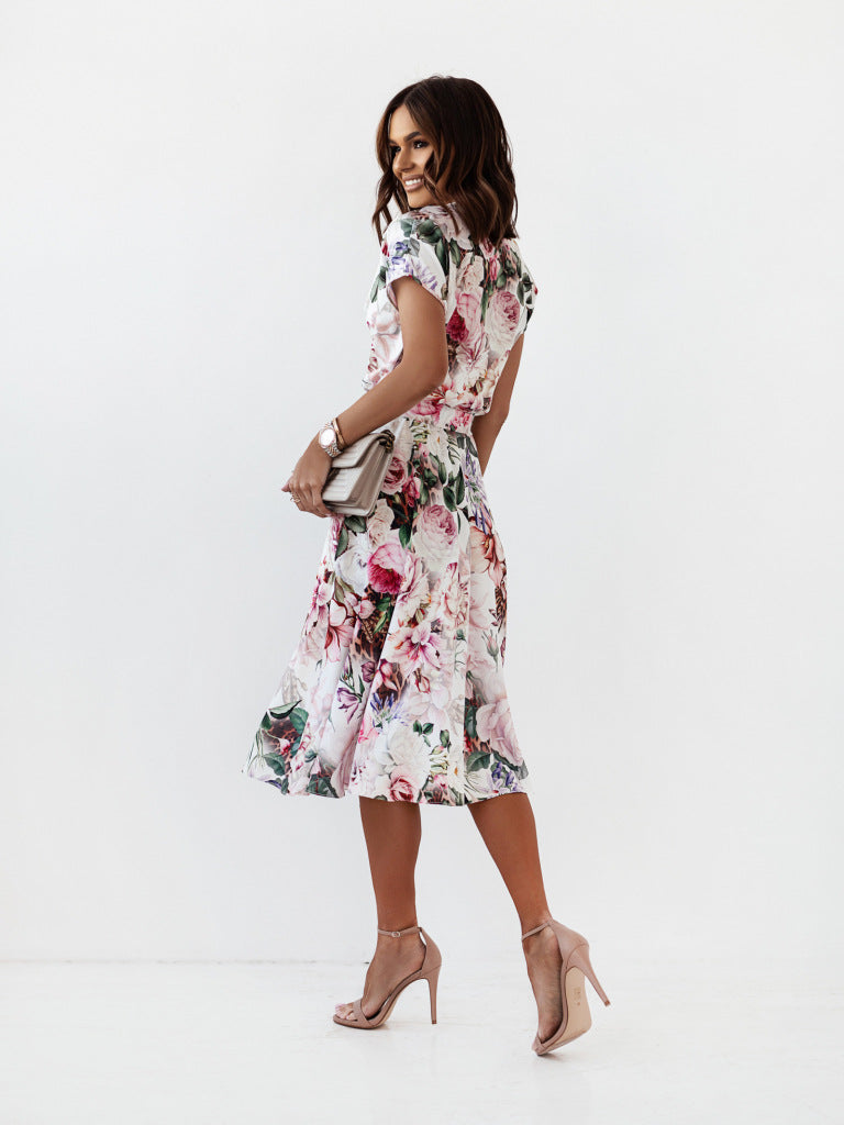 Dame blomsterprint omslagskjole med elegante sommerfugleærmer Stilla