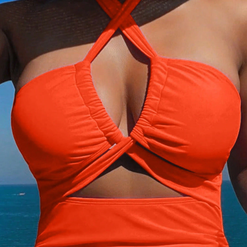 Dame én-del badesuit med stilfuld kryds-design Skovae