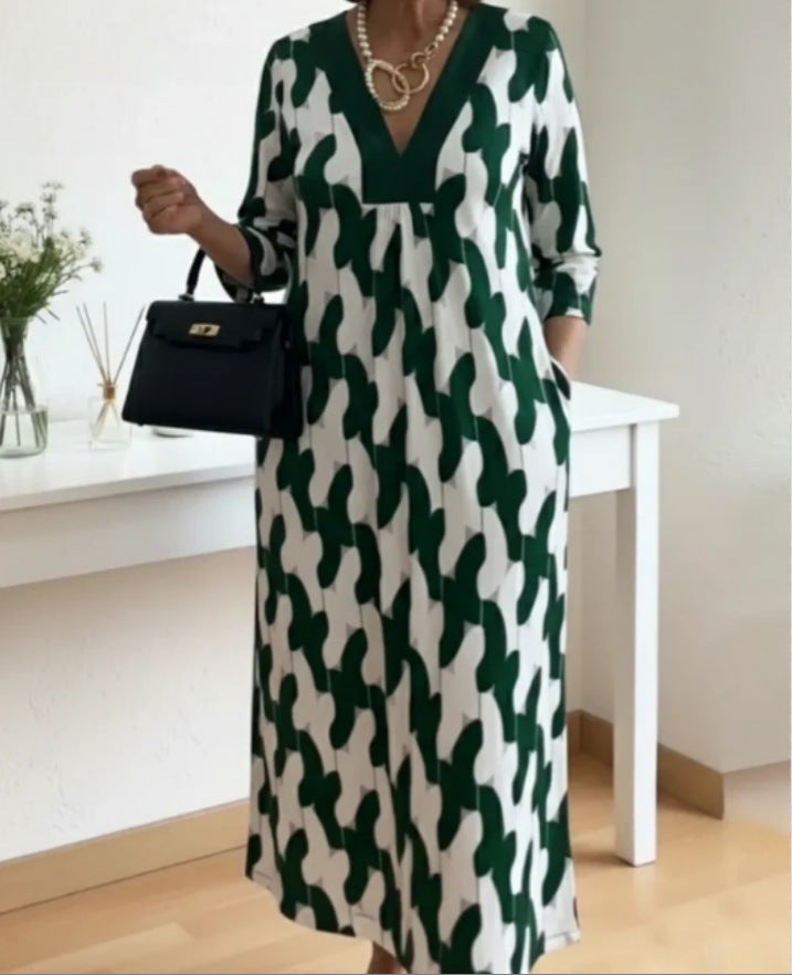 Kvindernes casual maxi kjole med elegant V-hals og praktiske sidelommer Stilla