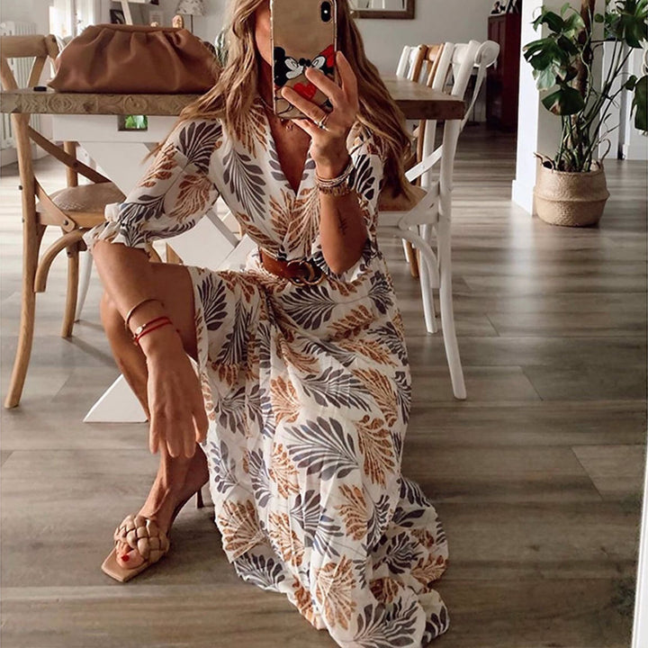 Dame maxikjole med elegant talje og blomstret bladdesign Stilla