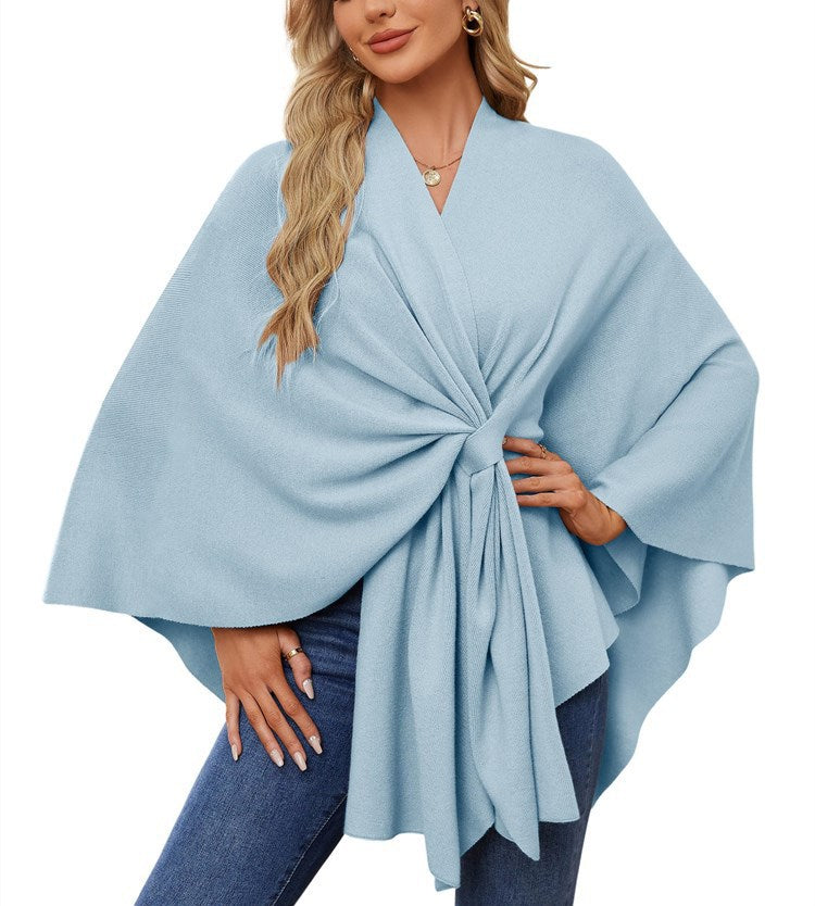 Dame elegant strikkeponcho med raffinerede draperinger og taljebælte Stilla