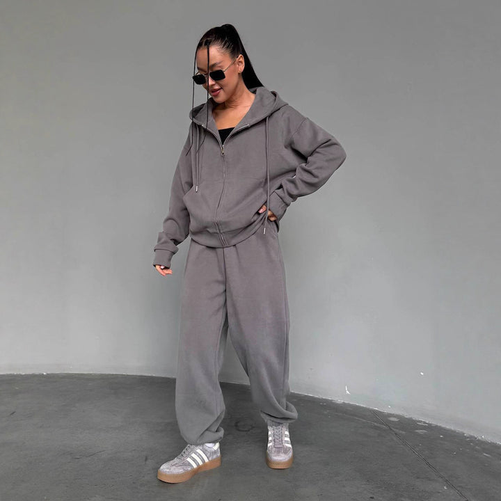 Kvindernes komfortable hættetrøje jumpsuit med høj kvalitets lynlås og afslappet pasform