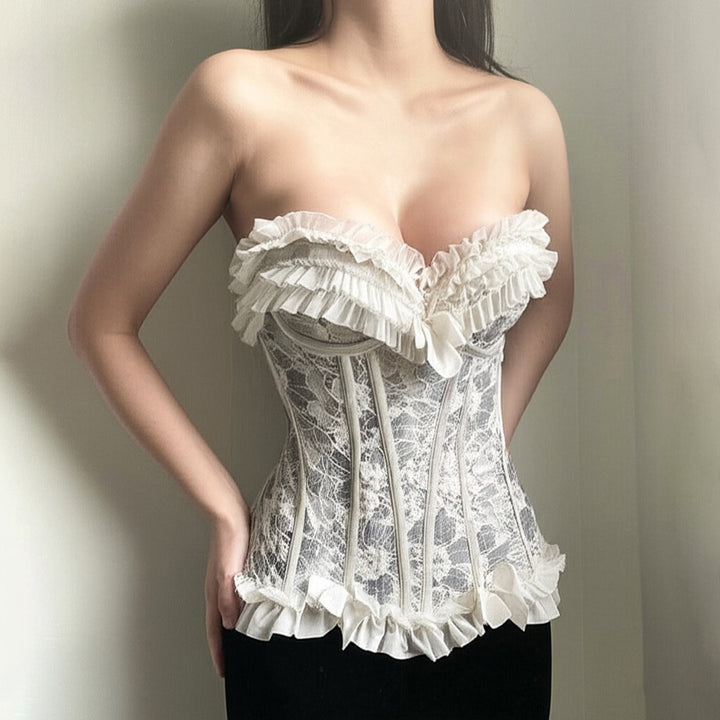 Dame spids-bustier med ruffles detaljer og sløjfer Skovae