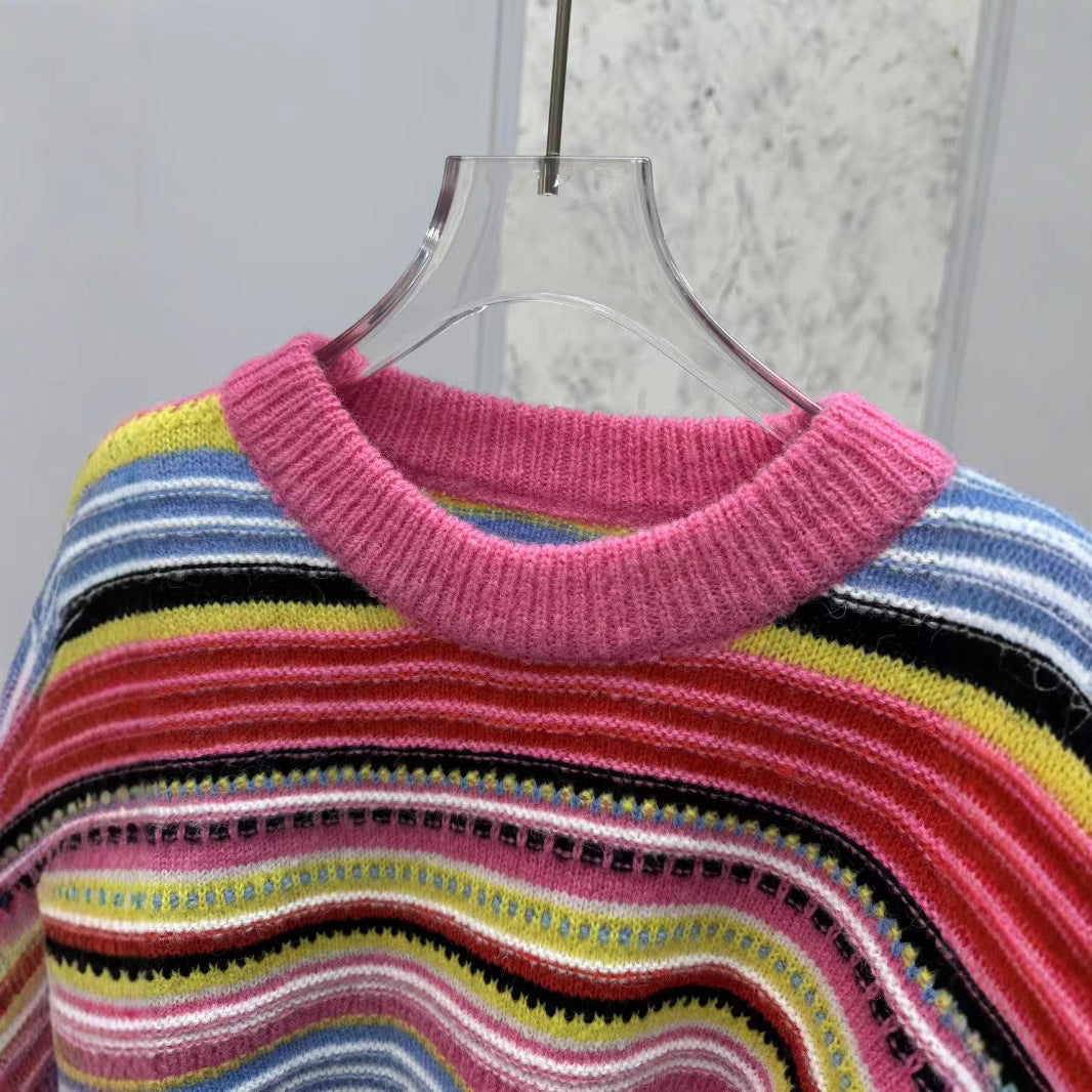 Dame sweater med farverigt stribet design og voluminøse ærmer Stilla