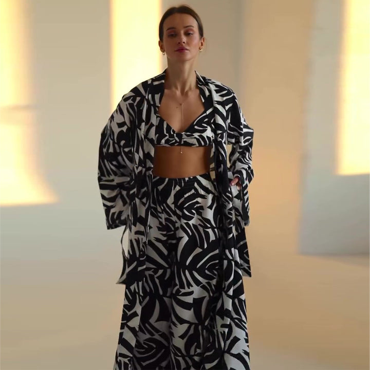 Kvinders strandoutfit med trendy blomsterprint Skovae