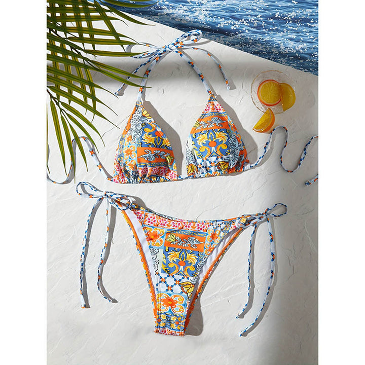 Dame triangle bikini med farverigt blomsterdesign og legende bindebånd Skovae