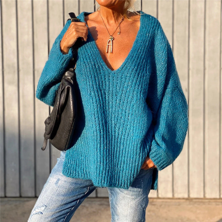Dame afslappet V-hals sweater med volumøse ærmer og fint strukturmønster Stilla