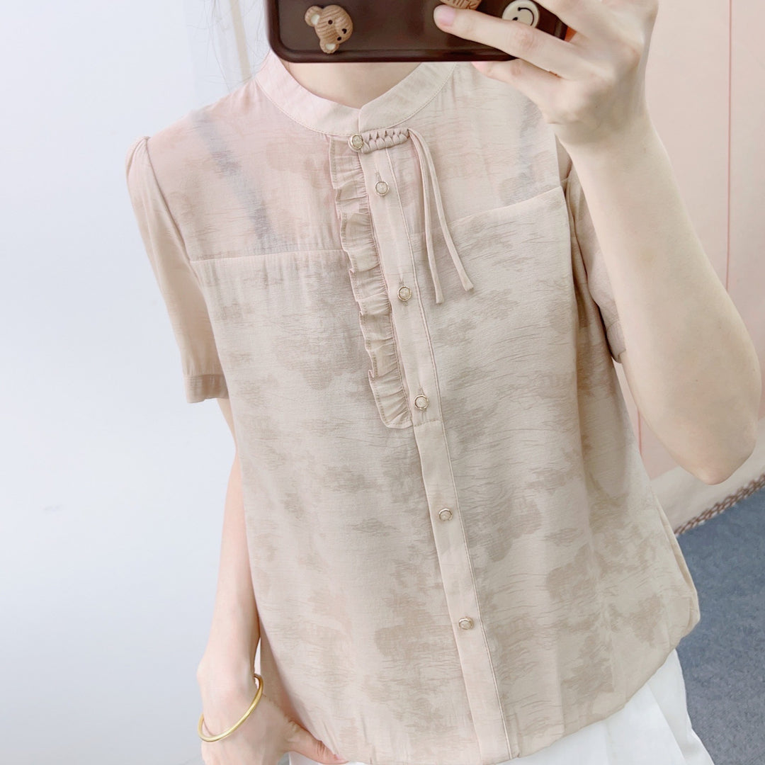 Dame chiffonbluse med elegant høj krave og fine ruffle detaljer Stilla