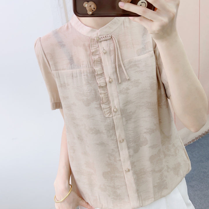 Dame chiffonbluse med elegant høj krave og fine ruffle detaljer Stilla