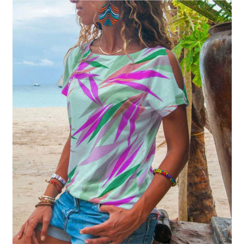 Kvinders T-shirt med asymmetrisk snit og farverigt bladmotiv Stilla