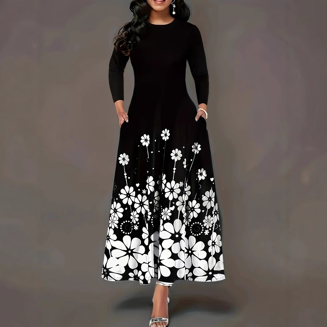 Dame maxikjole med blomstret design og praktiske lommer Stilla