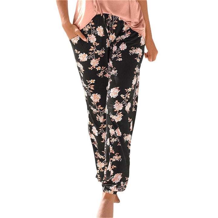 Dame let Jersey-bukser med blomsterprint Stilla