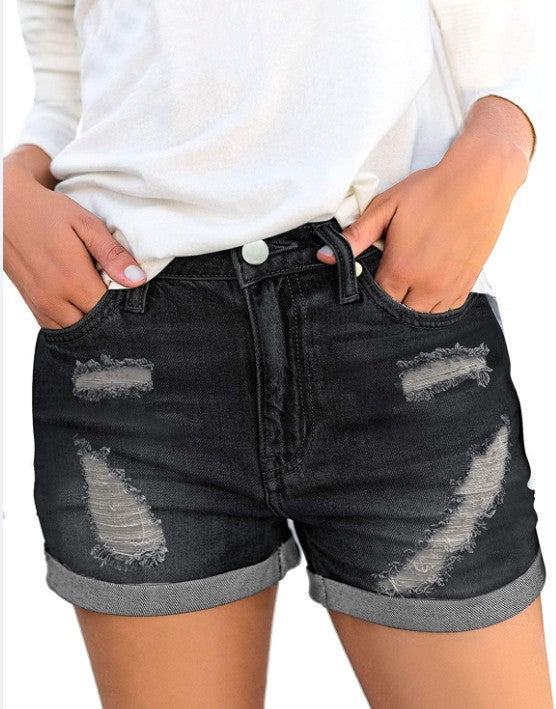 Dame jeansshorts med moderne rivdetaljer og afslappet snit Skovae