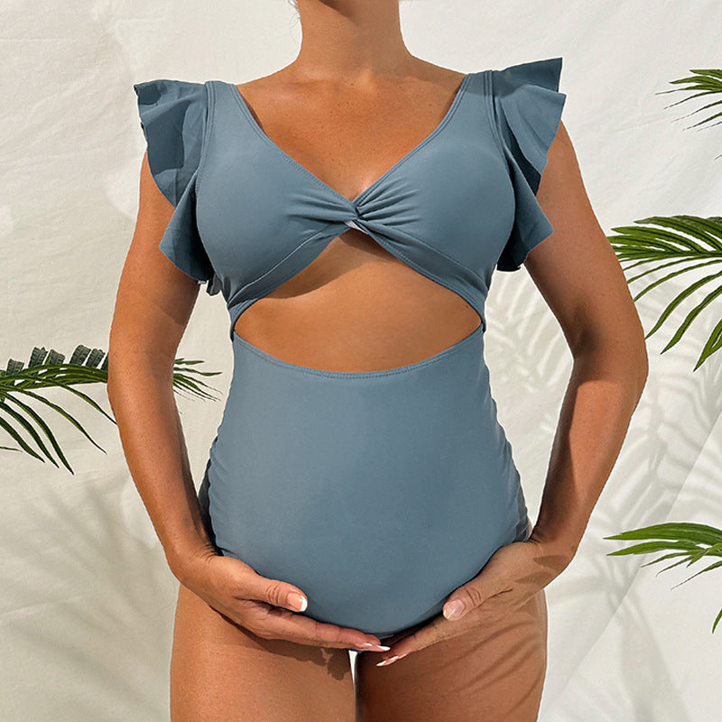 Dame one-piece swimsuit with romantic ruffle details Skovae
