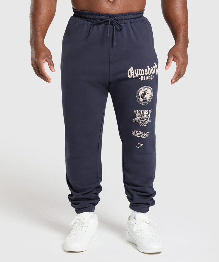 Herre nan konisk skåret bomuldsfleece-sweatpants med elastisk snoretræk ribbede benafslutninger og stort logotryk Skovae