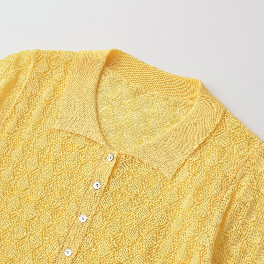 Dame kortærmet pullover med luftig hulstruktur og elegant krave Skovae