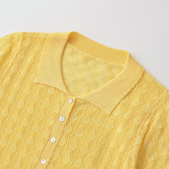 Dame kortærmet pullover med luftig hulstruktur og elegant krave Skovae
