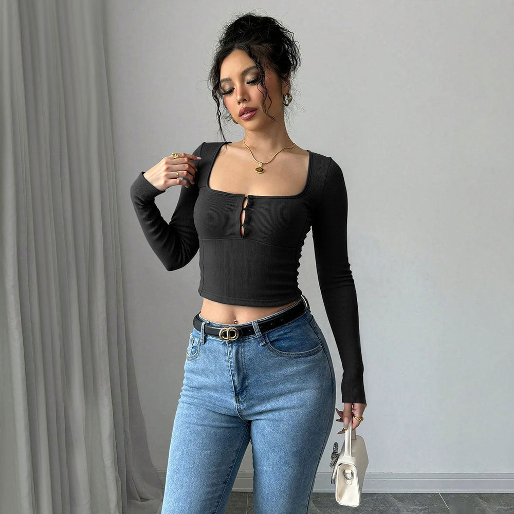 Kvinders langærmet cropped top med elegant knap-udsmykket front Stilla