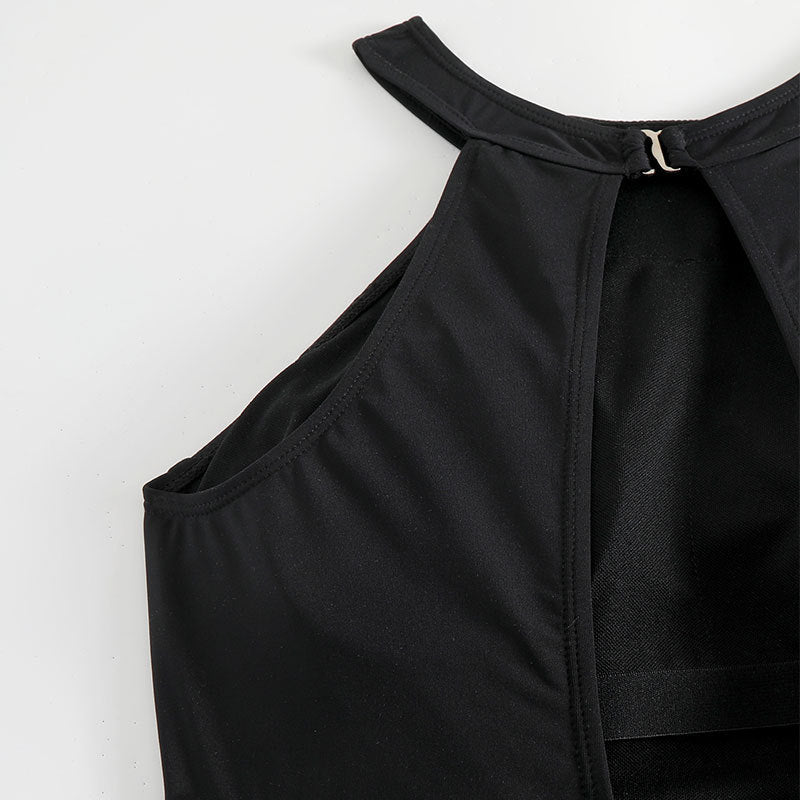 Dame én-dels badedragt med moderne cut-out-design og sporty stropper Stilla