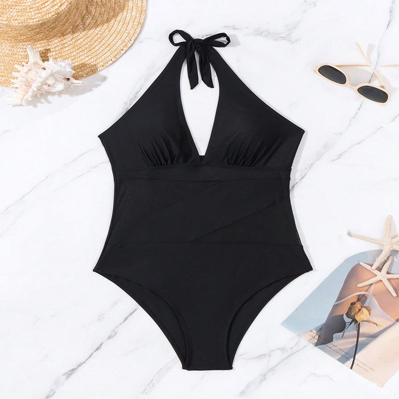 Dame one-piece badedragt med dyb V-hals og transparente indsatser Skovae
