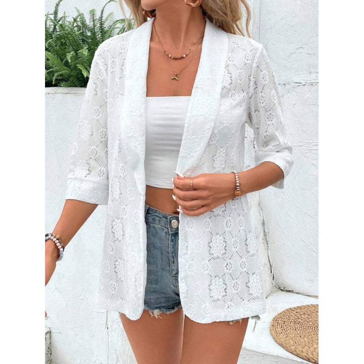 Dame spidsjakke i afslappet boho-stil med floralt design og 3/4-ærmer Skovae