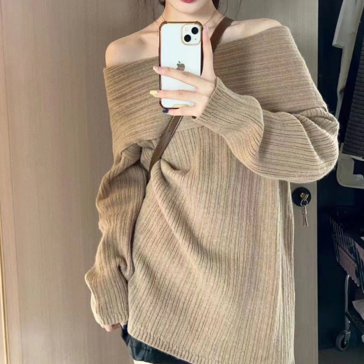 Kvinders off-shoulder sweater lavet af struktureret strikmateriale Stilla