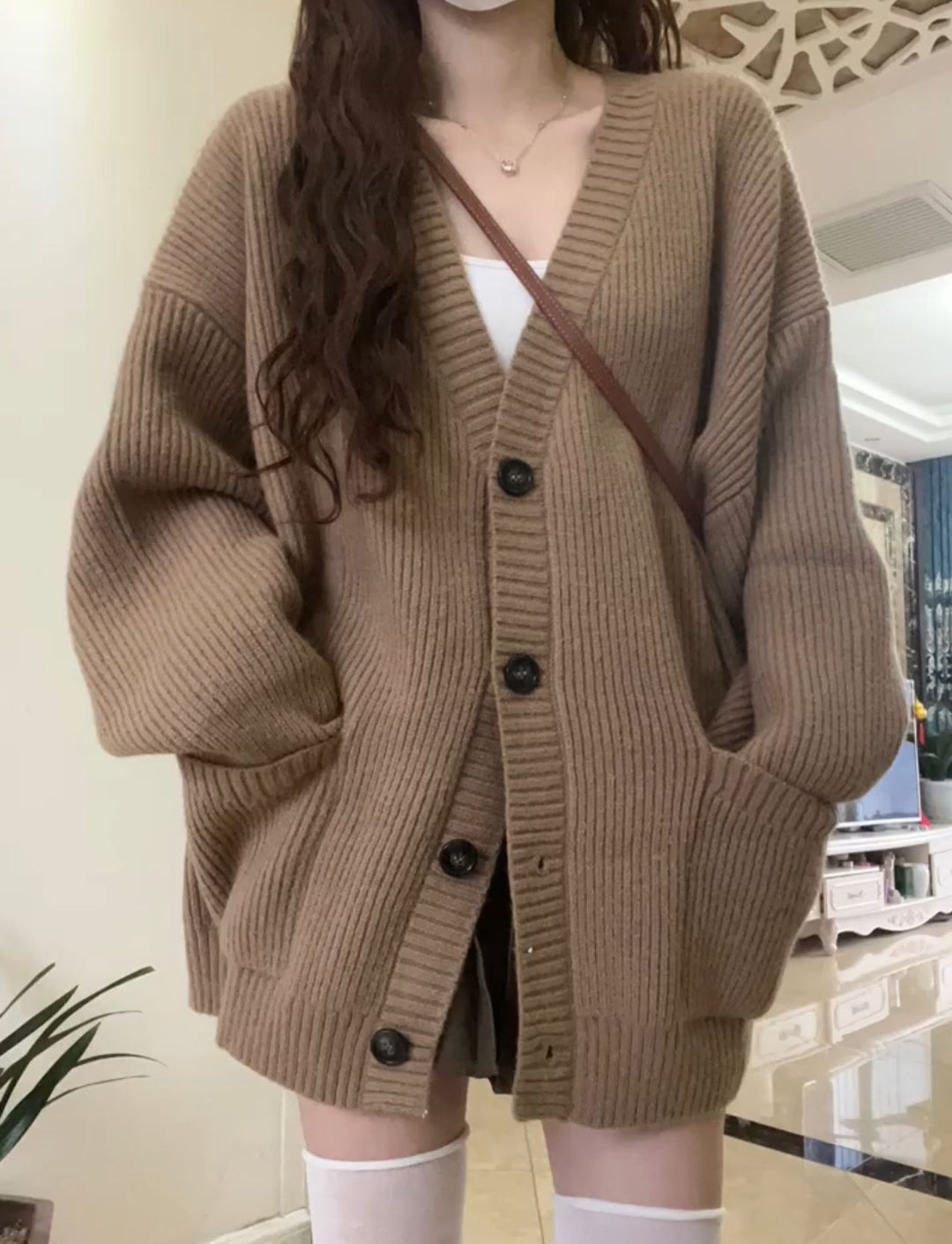 Kvindernes hyggelige cardigan med dyb V-hals og store lommer Stilla