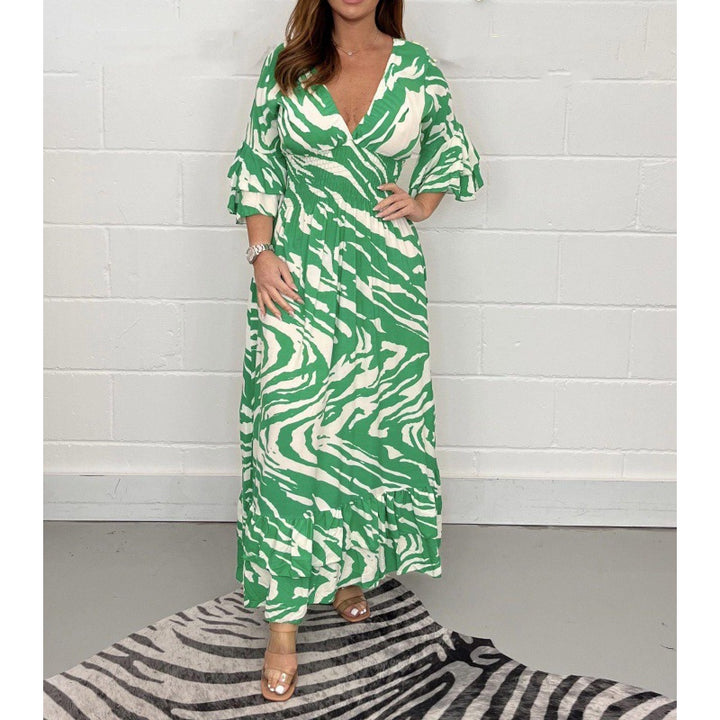 Dame maxikjole i moderne animal-print Stilla